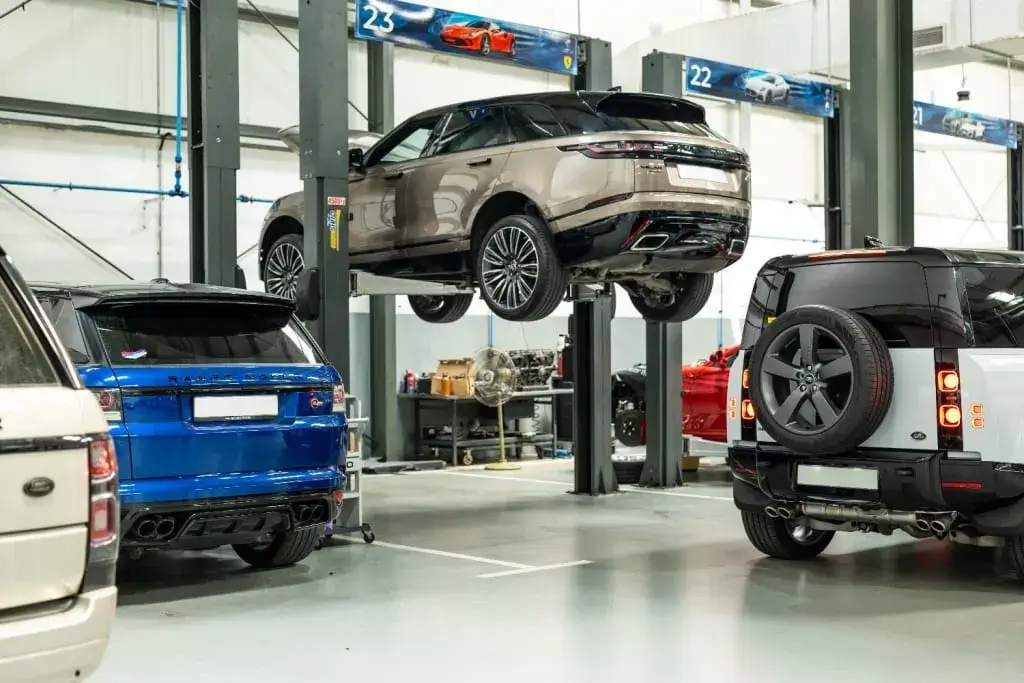 Master mechanic performing auto car maintenance at OBD Car Workshop UAE